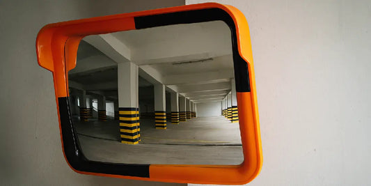 Traffic Mirrors for Blind Spots in Parking Garages: Improving Vehicle Navigation