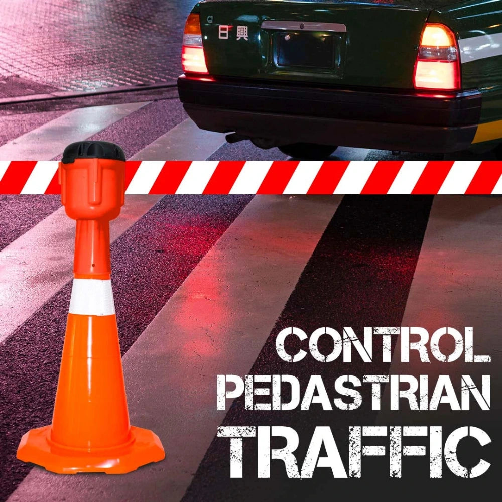 Orange traffic cone with red topper and white striped barrier tape and a car in the background.