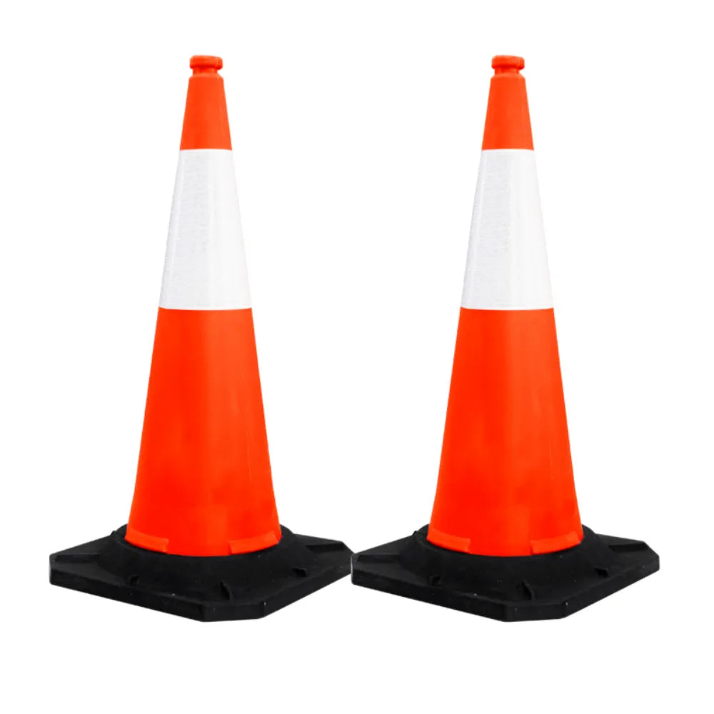 Two orange traffic cones with reflective white stripes