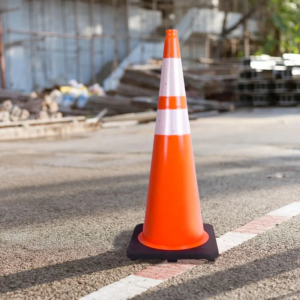 Orange traffic cone on a road