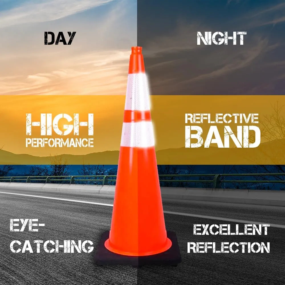 Orange traffic cone with reflective band on a road