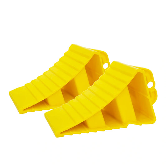 Two yellow plastic wedges on a white background