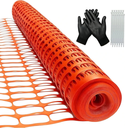 orange safety netting with black gloves and a white fence 