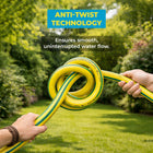 Person holding garden hose with 'Anti-Twist Technology