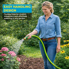 Woman watering plants with a garden hose in a garden setting