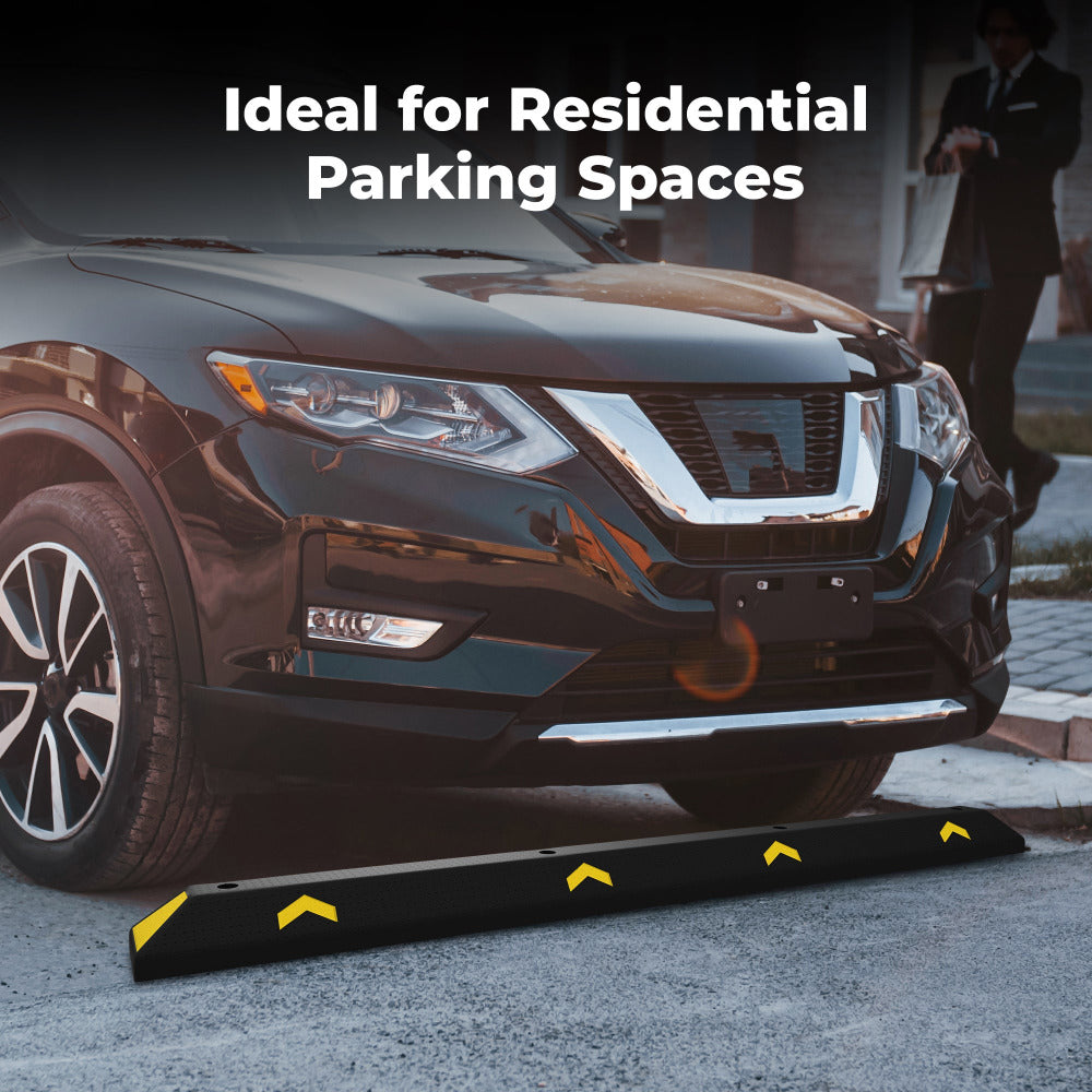 Black SUV with a black and yellow wheel stopper in front, ideal for residential parking spaces.