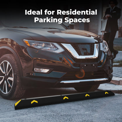 Black SUV with a black and yellow wheel stopper in front, ideal for residential parking spaces.