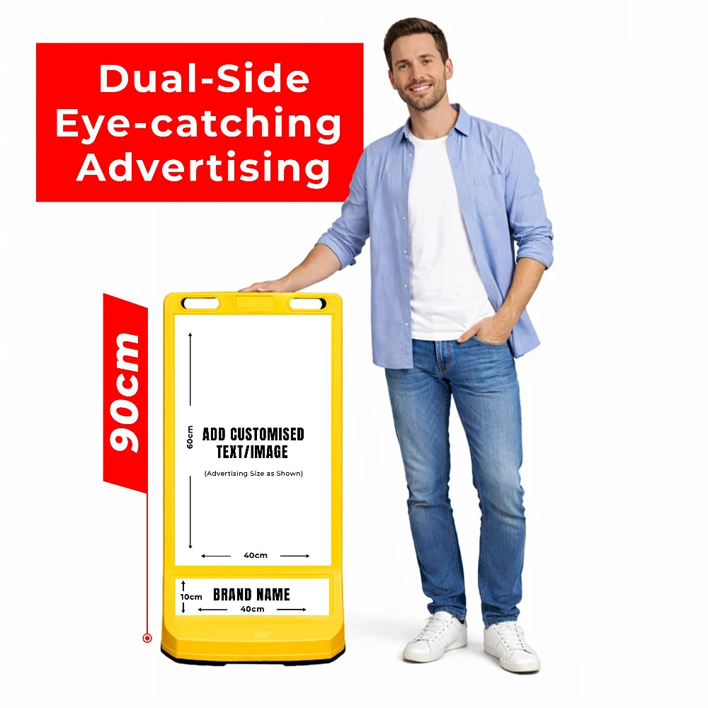 Man standing next to a yellow advertising board with customizable tex