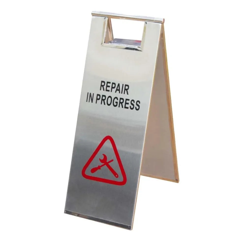 Metal sign with 'Repair in Progress'