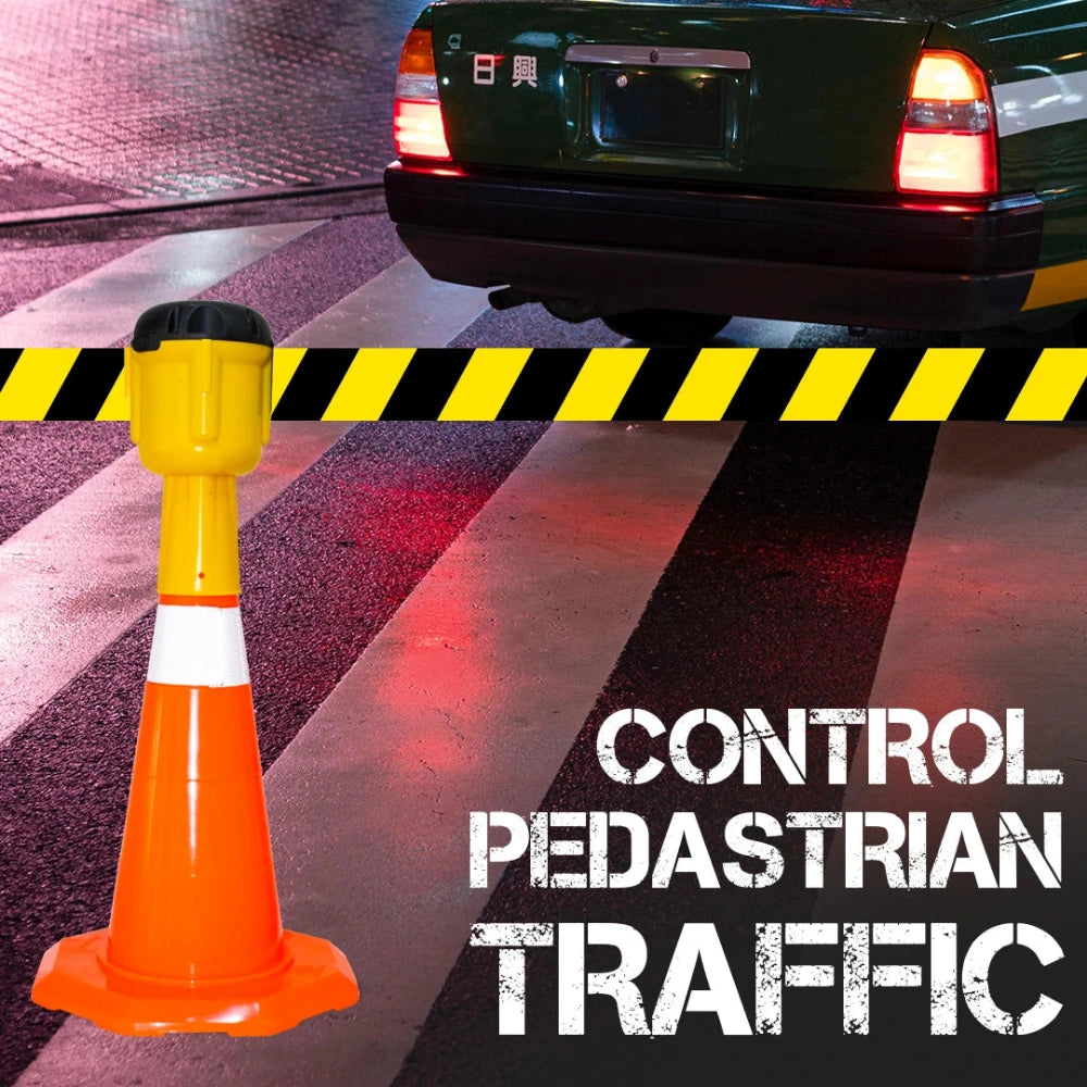 Orange traffic cone with black and yellow hazard tape and a car