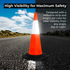 High visibility orange traffic cone on a road