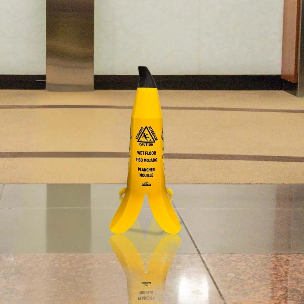 yellow banana cone sign for slippery floor awareness and safety