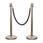 Two silver stanchions with a black rope