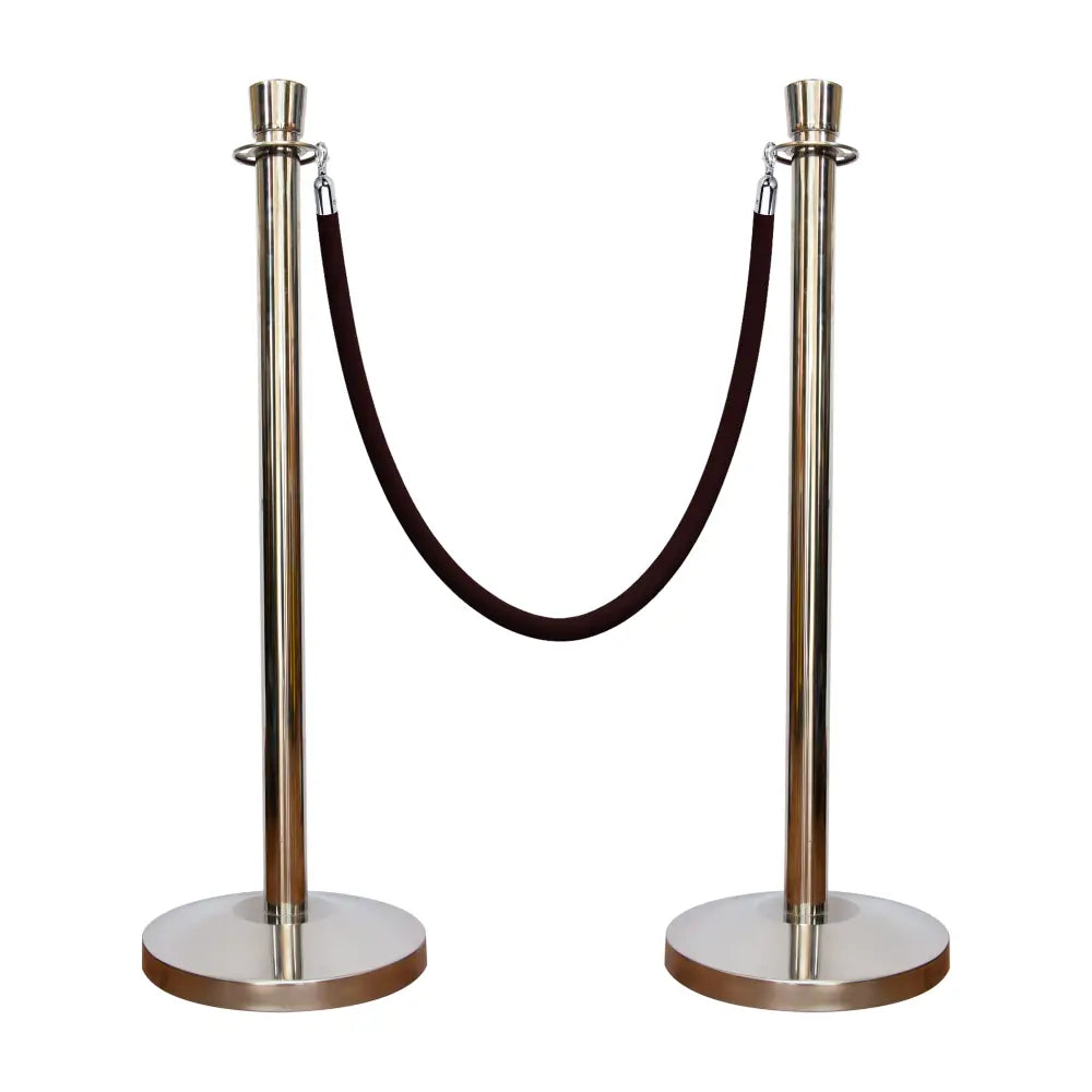 Two silver stanchions with a black rope