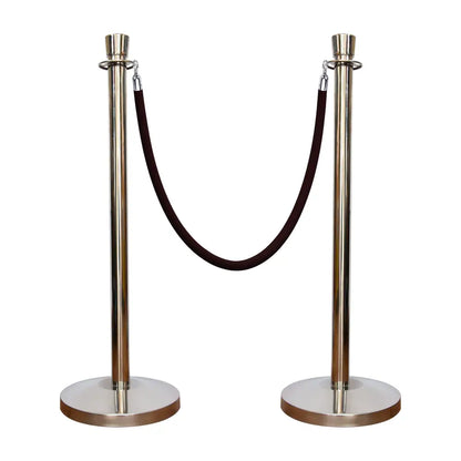 Two silver stanchions with a black rope