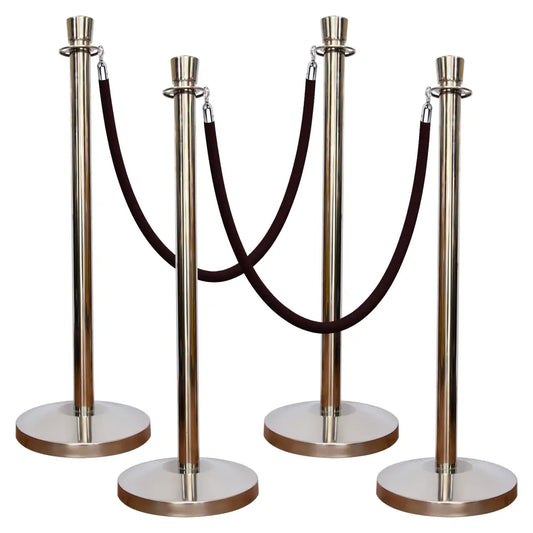 Set of four silver stanchion posts with black rope