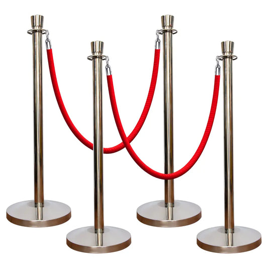 Set of four silver stanchions with red ropes