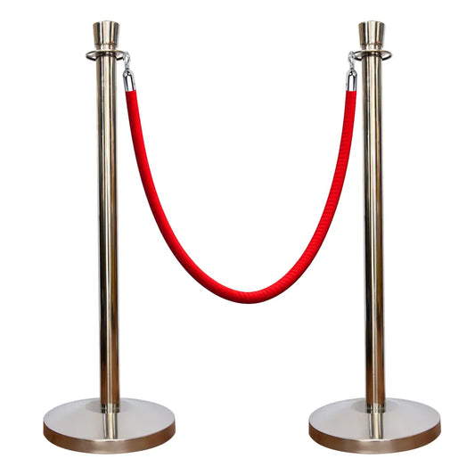 Two silver stanchions with a red rope