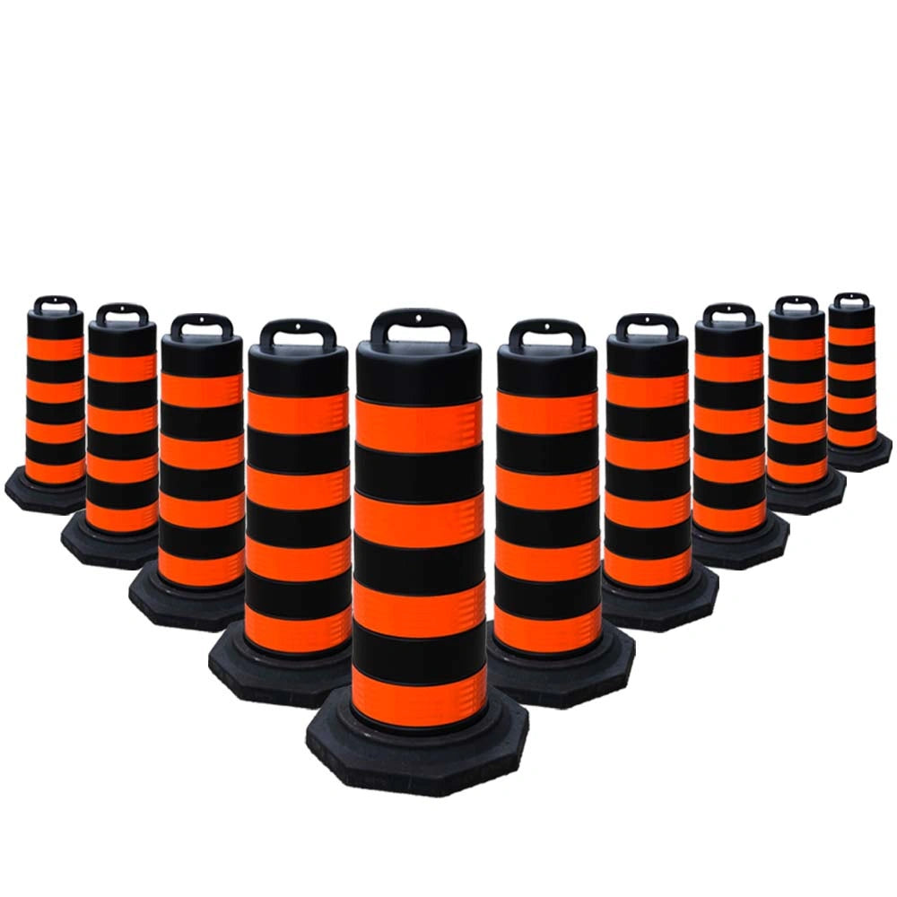 Row of black and orange traffic barrel