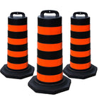 Three black and orange striped traffic barrel 