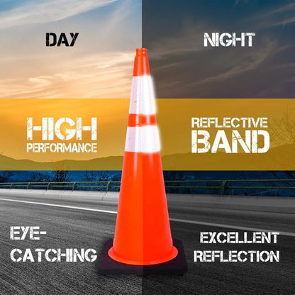 Orange traffic cone with reflective band on a road