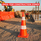 Orange traffic cone on a construction site 
