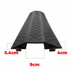 Black plastic cover with measurements on a white background